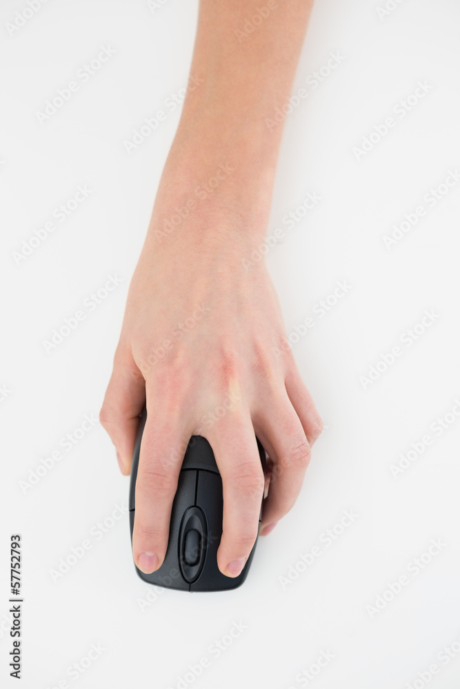 Close-up of a hand using computer mouse Close-up of a hand using computer mouse