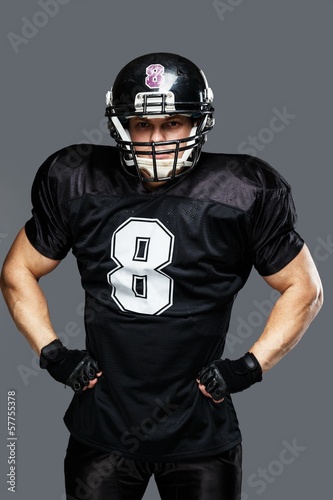 American football player with helmet and armour