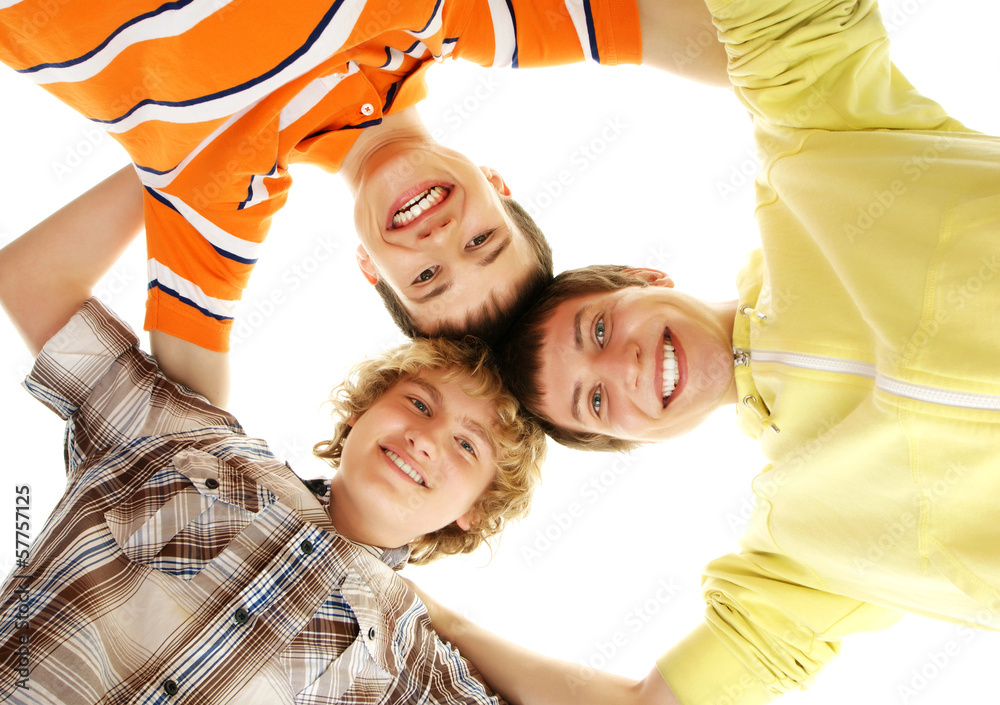 Obraz premium A group of happy teenagers isolated on a white background