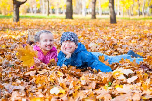 childs in autumn park