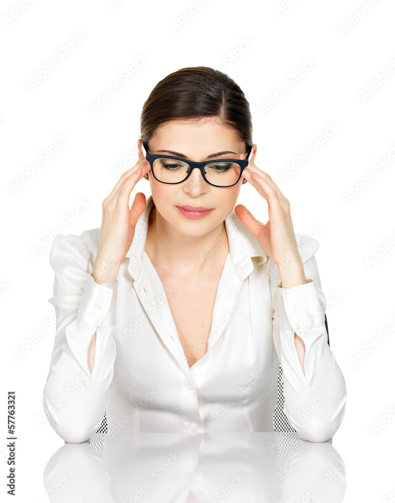 Portrait of a young woman in glasses with headache Portrait of a young woman in glasses with headache