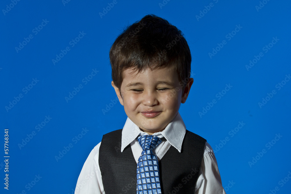 Happy Leader, cute little boy portrait over blue chroma backgrou Happy Leader, cute little boy portrait over blue chroma backgrou