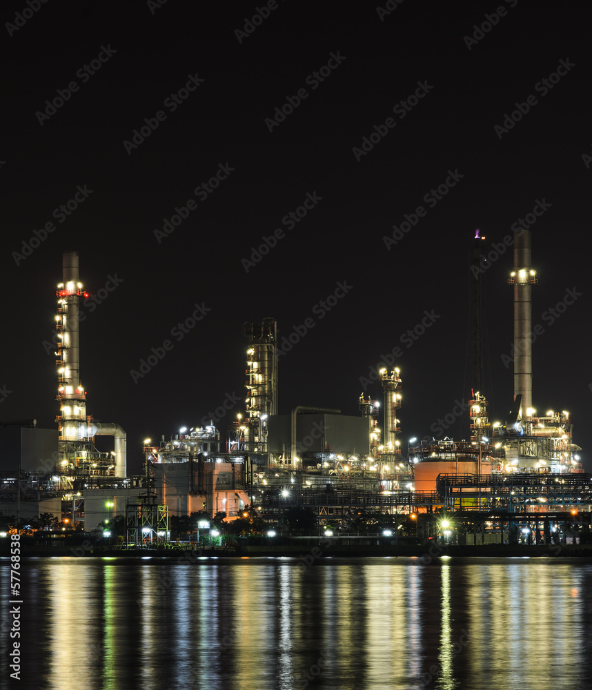 Oil refinery plant in night scene