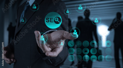 businessman hand showing search engine optimization SEO