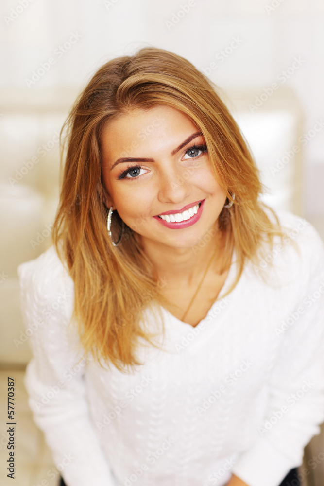 Closeup portrait of a young cheerful woman Closeup portrait of a young cheerful woman