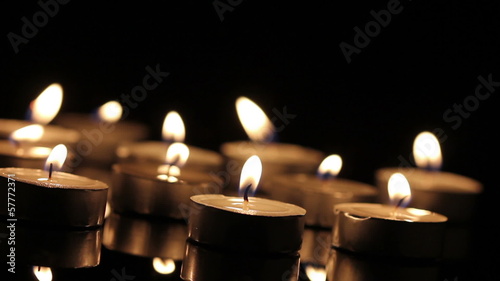 Many burning candles with shallow depth of field