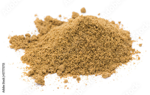 Heap of ground cumin isolated on white background photo