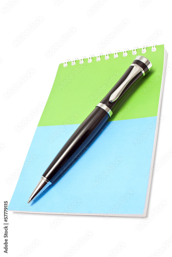 Notepad and pen isolated on white Notepad and pen isolated on white