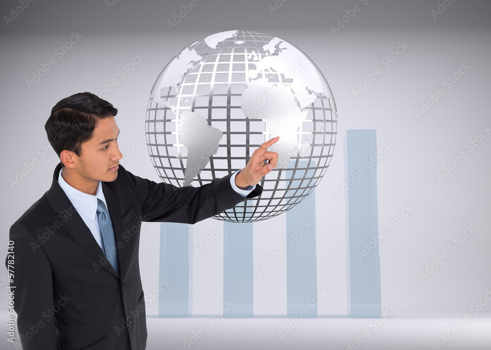 Composite image of stern asian businessman pointing Composite image of stern asian businessman pointing
