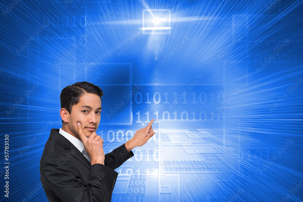 Composite image of thoughtful asian businessman pointing Composite image of thoughtful asian businessman pointing