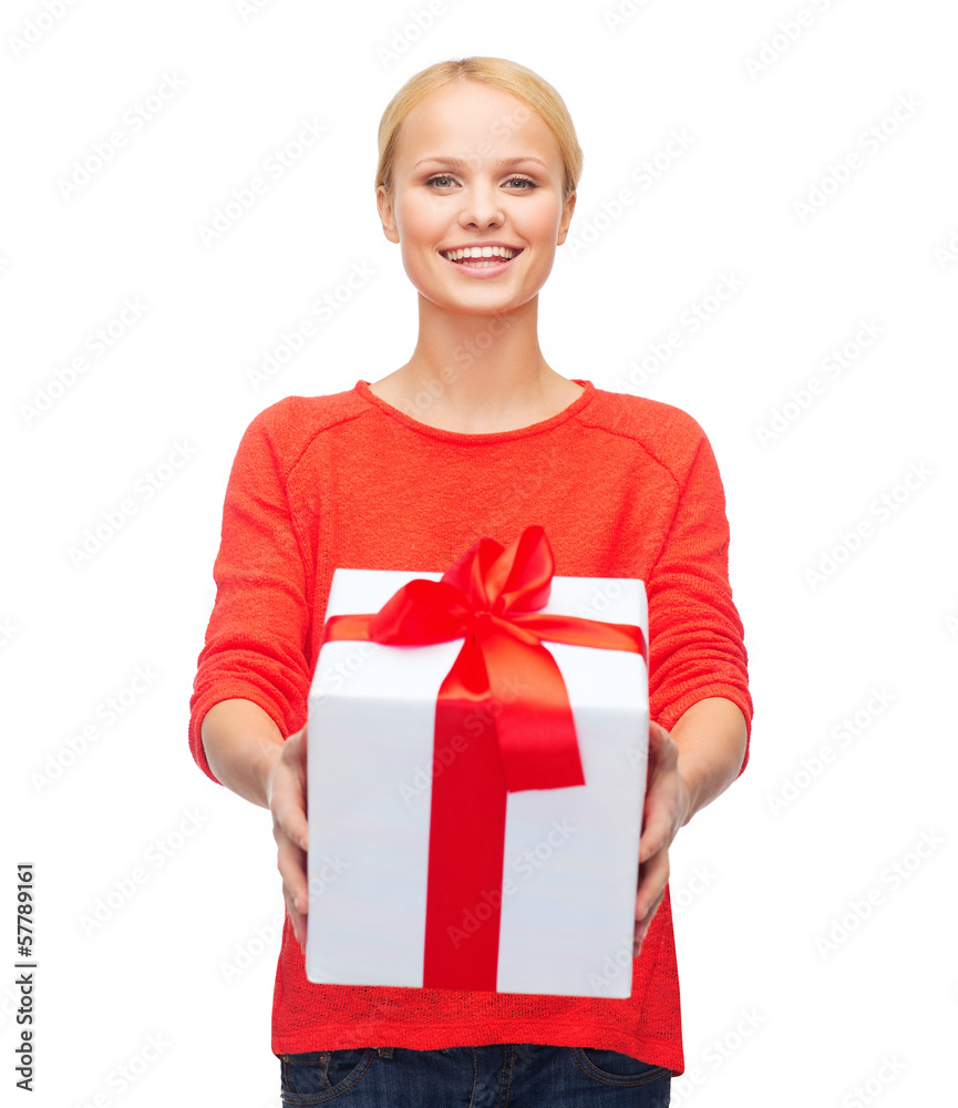 smiling woman in red sweater with gift box smiling woman in red sweater with gift box