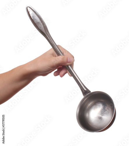 Hand holds a ladle (kitchen spoon), isolated on white background
