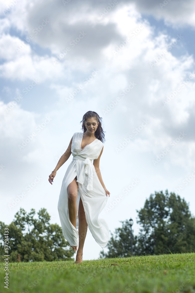 Sexy young woman in long white dress Sexy young woman in long white dress