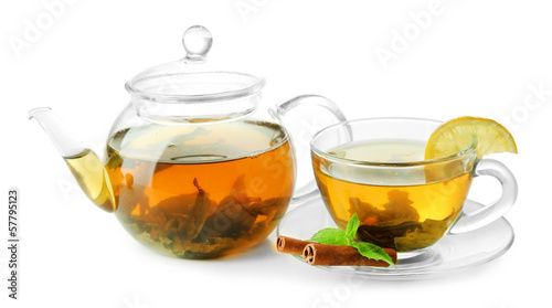 Cup and teapot of green tea isolated on white