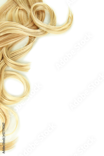 Curly blond hair close-up isolated on white