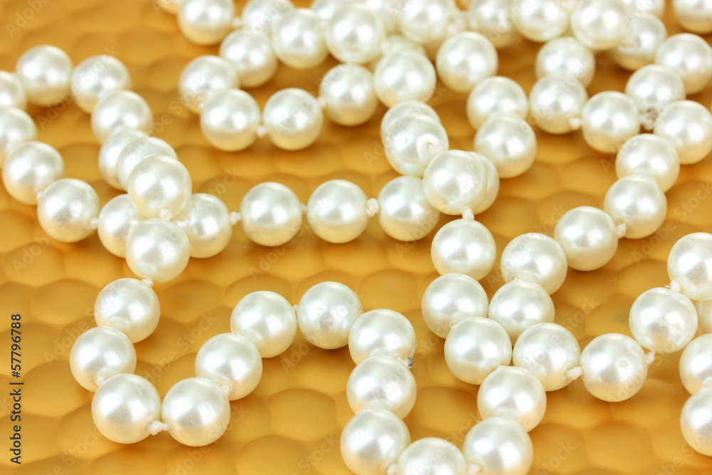 Color beads on bright background, close-up Color beads on bright background, close-up