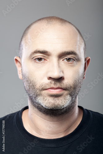 man portrait isolated on gray background