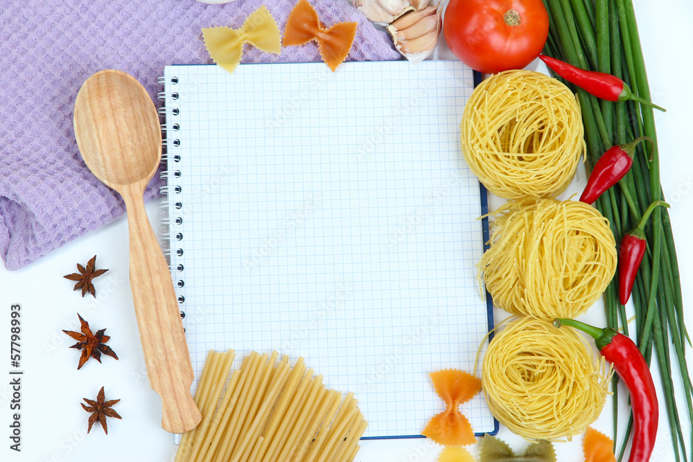 Cooking concept. Groceries with empty cookbook close up Cooking concept. Groceries with empty cookbook close up