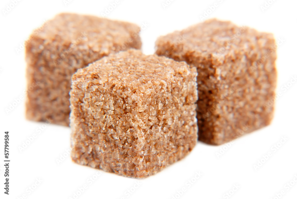 Cubes of sugar with cinnamon isolated Cubes of sugar with cinnamon isolated