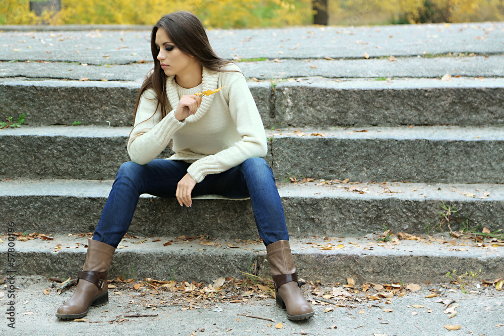 Young lonely woman outdoors