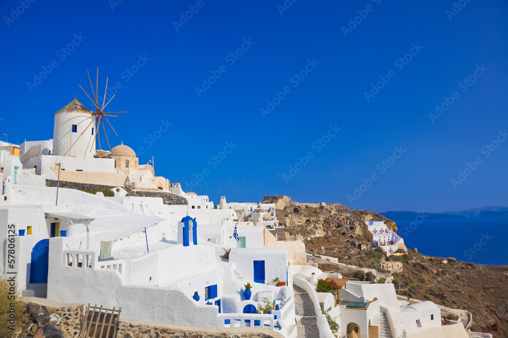 Fototapeta premium Windmill in Oia at Santorini island, Greece