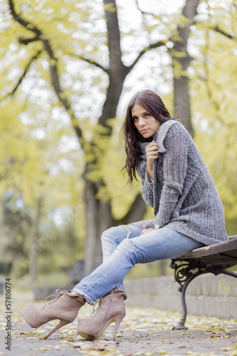 Young woman at autumn park
