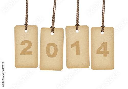 New Year 2014 concept. Brown tags isolated on white