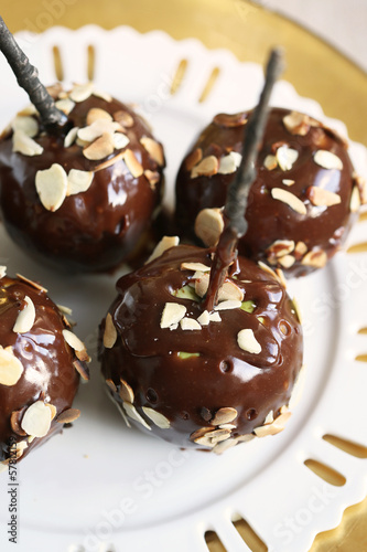 apples in creamy caramel with almonds on new year's table