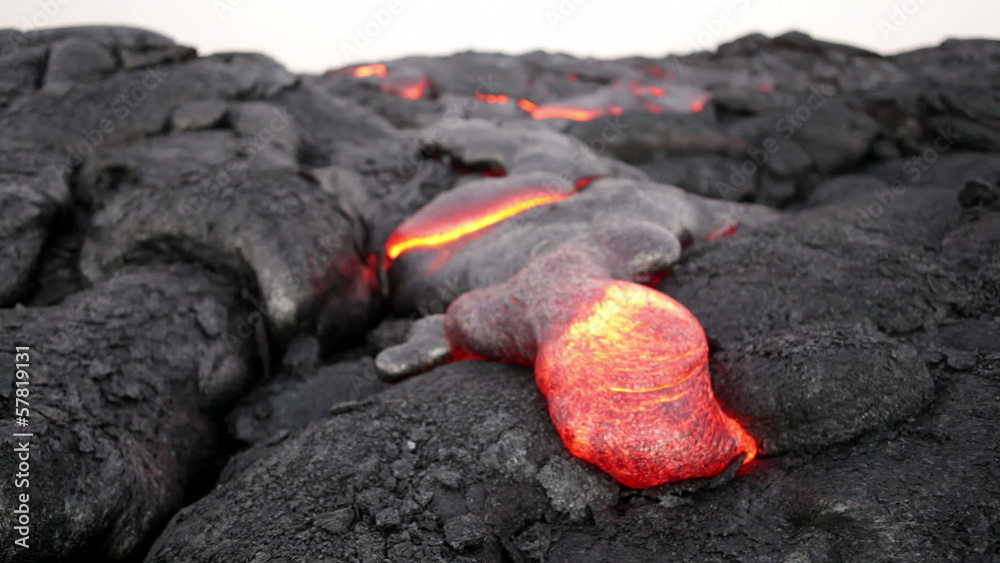 Molten lava flow at Kilauea volcano, Hawaii Molten lava flow at Kilauea volcano, Hawaii
