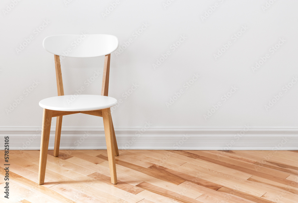 White chair in an empty room - obrazy, fototapety, plakaty 