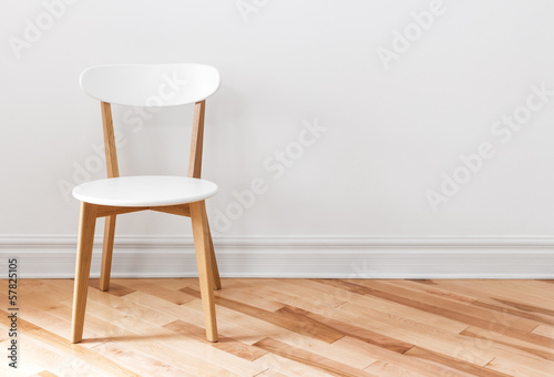 White chair in an empty room photo
