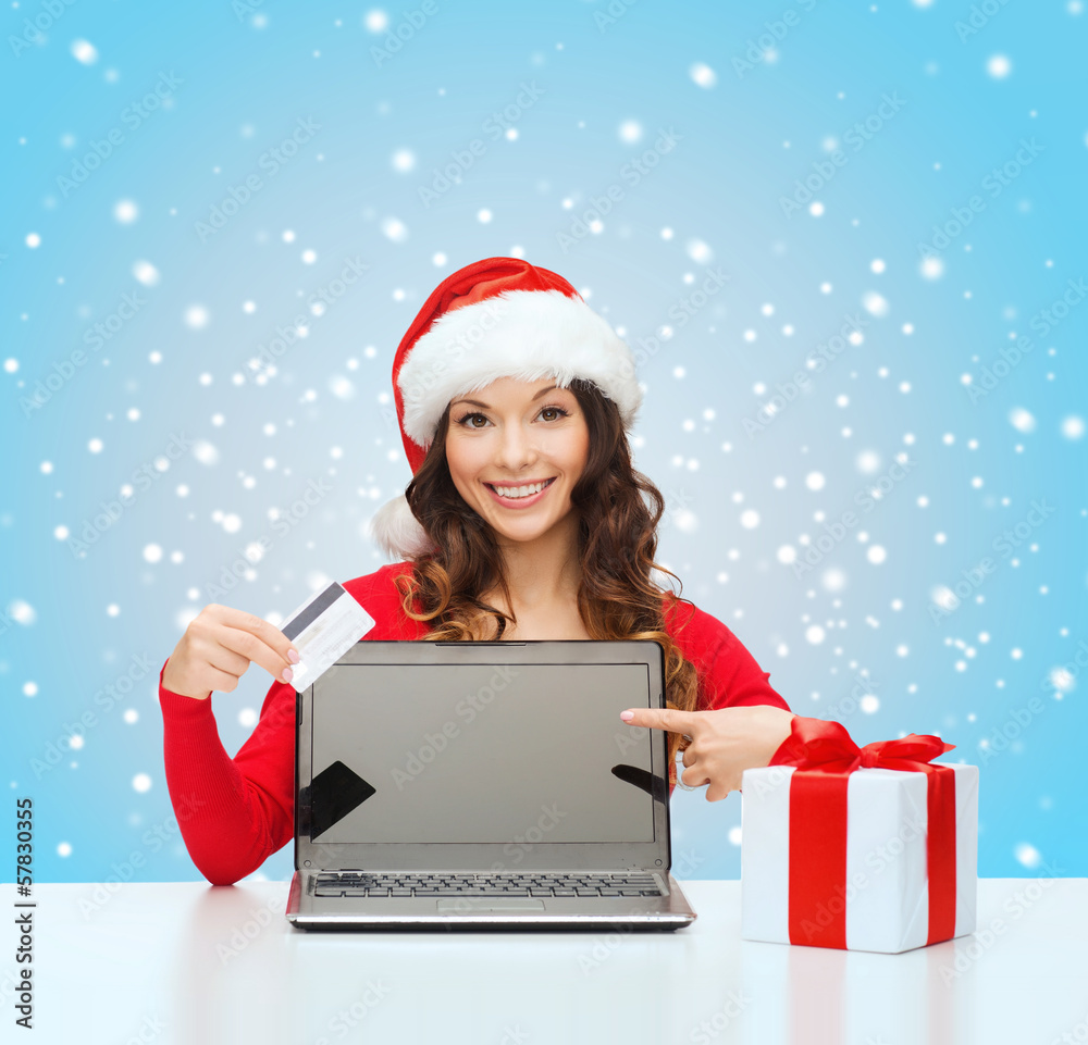 woman with gift, laptop computer and credit card woman with gift, laptop computer and credit card
