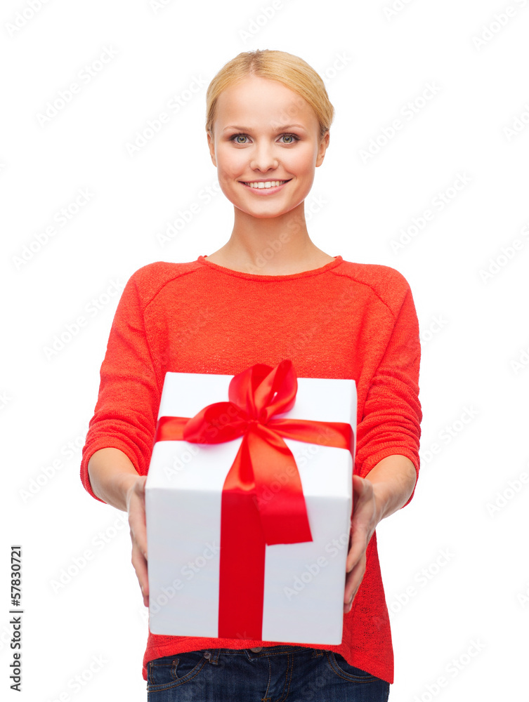 smiling woman in red sweater with gift box smiling woman in red sweater with gift box