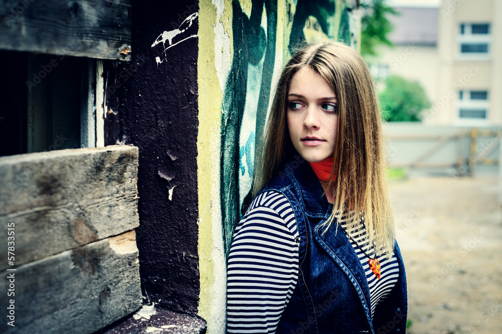 Fototapeta premium curious woman looking in uncertainty of darkness