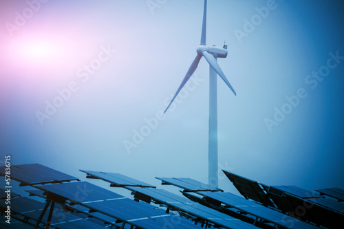 Green energy - solar panels and wind turbine.