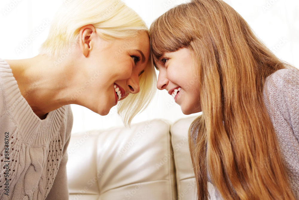 Fototapeta premium Mother and daughter having fun at home