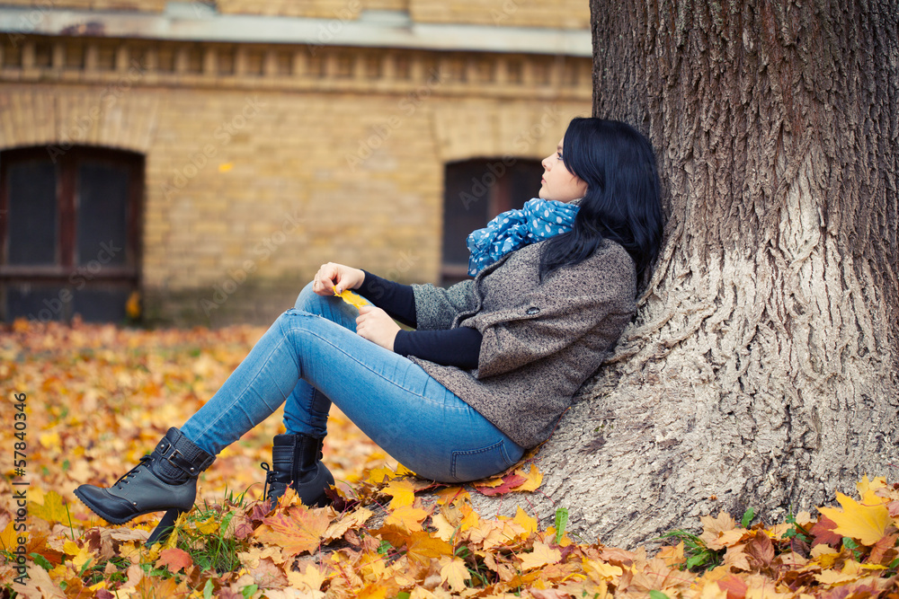 Young pretty woman in autumn park Young pretty woman in autumn park