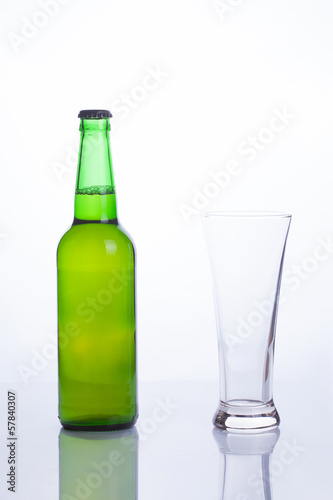 Beer bottle and empty mug