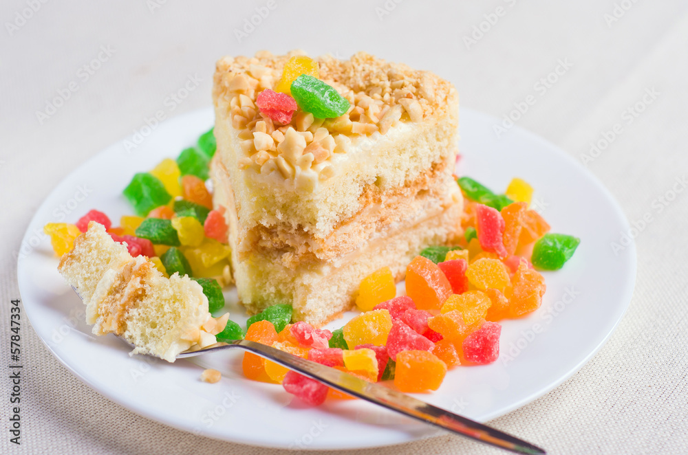 Delicious biscuit cake sprinkled with chopped nuts Delicious biscuit cake sprinkled with chopped nuts