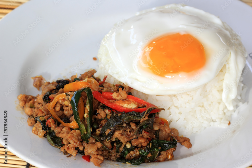 Pad Krapao Moo, spicy stir-fried pork with Thai Holy basil and c Pad Krapao Moo, spicy stir-fried pork with Thai Holy basil and c