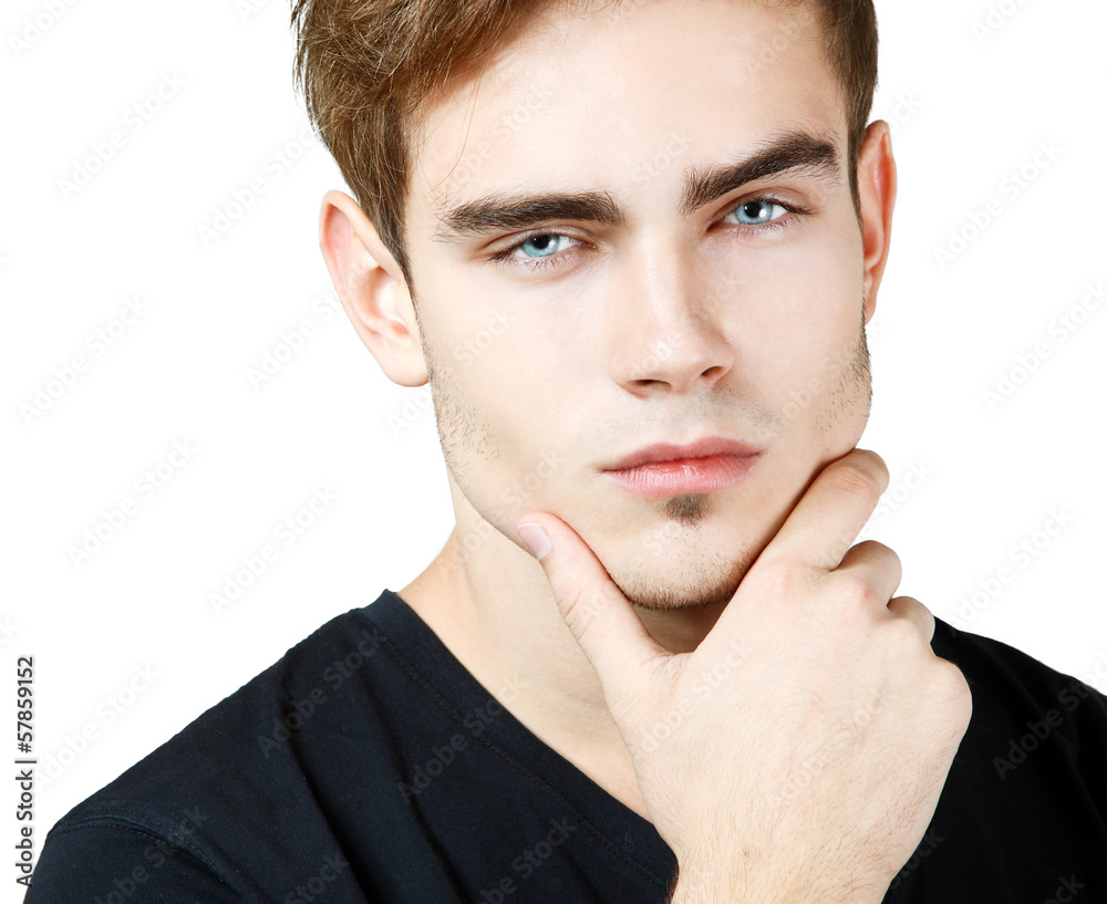 Fototapeta premium Young man handsome face closeup, sexy guy looking at camera over