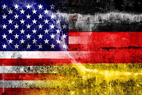 USA and Germany Flag painted on grunge wall #57864360