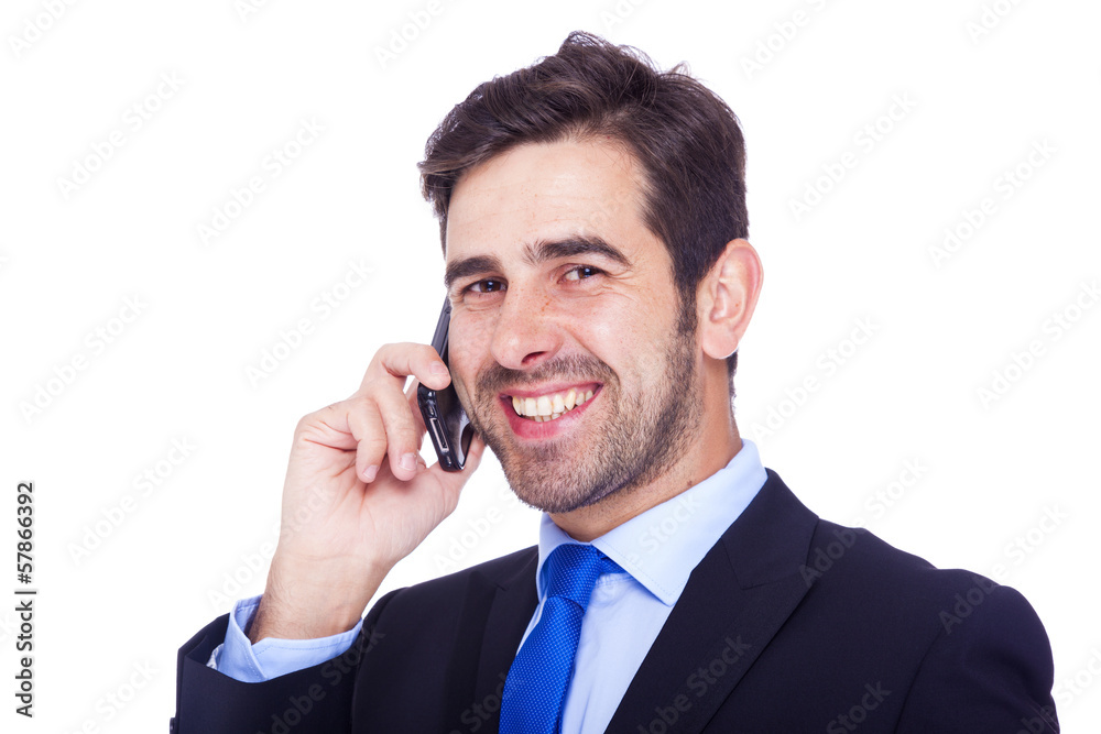 Handsome business man talking on the phone, isolated on a white Handsome business man talking on the phone, isolated on a white