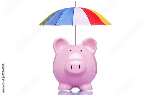 Piggy bank with a multicolored umbrella