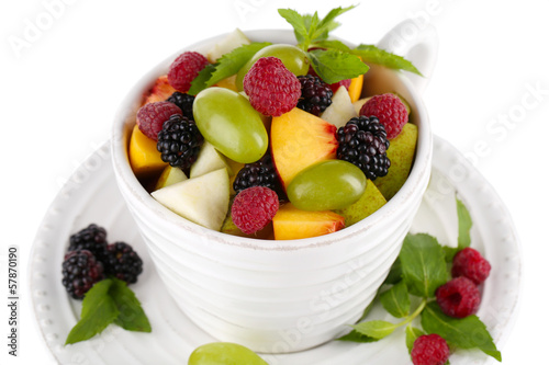 Fruit salad in cup isolated on white