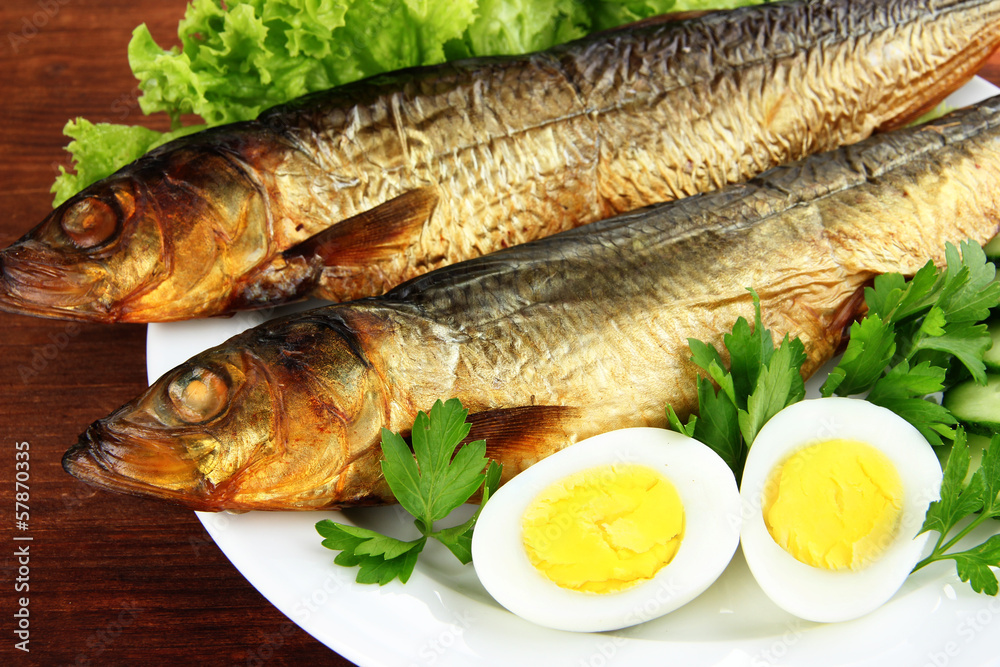 Smoked fish on plate close up Smoked fish on plate close up