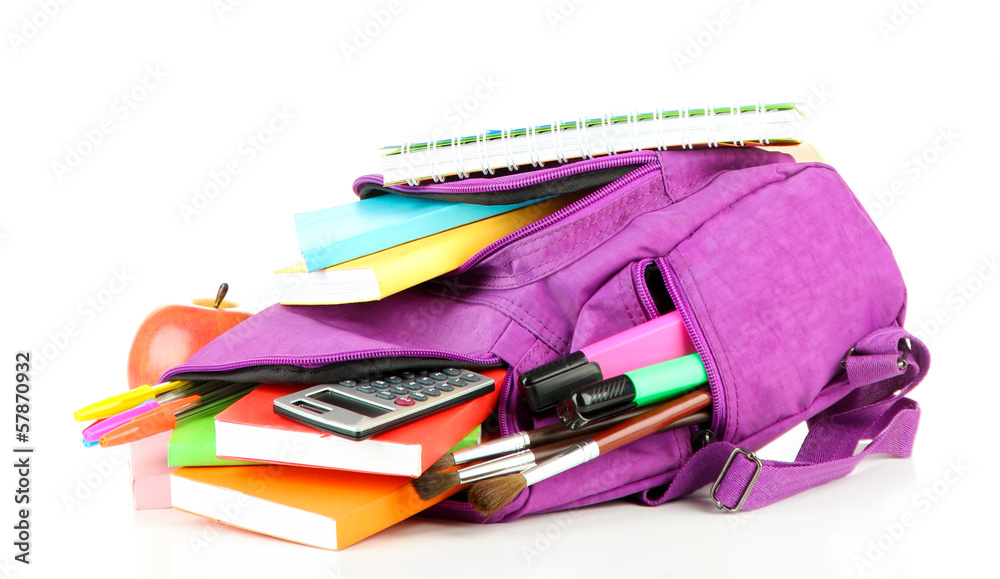 Purple backpack with school supplies isolated on white Purple backpack with school supplies isolated on white