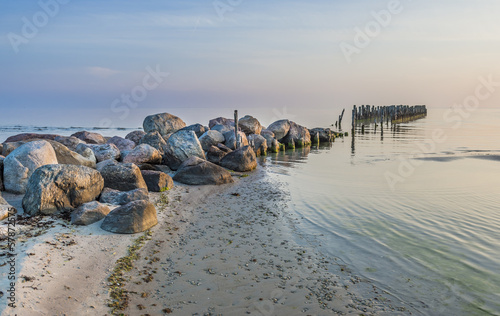 Old broken pier at dawn, Baltic Sea, Latvia