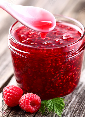 Raspberry jam with berry photo