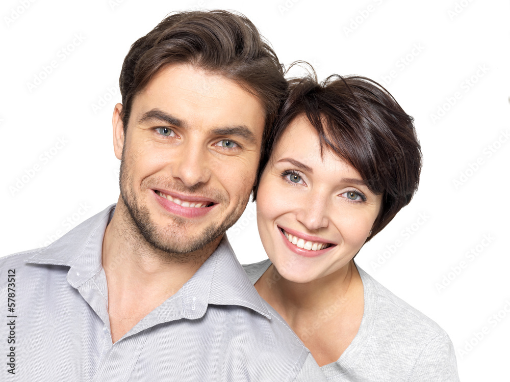 Closeup portrait of beautiful happy couple - isolated Closeup portrait of beautiful happy couple - isolated